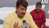 Chhath Puja: Manoj Tiwari target's Delhi government, rides boat in toxic foam-covered Yamuna in Delhi