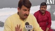 Chhath Puja: Manoj Tiwari target's Delhi government, rides boat in toxic foam-covered Yamuna in Delhi