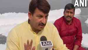 Chhath Puja: Manoj Tiwari target's Delhi government, rides boat in toxic foam-covered Yamuna in Delhi