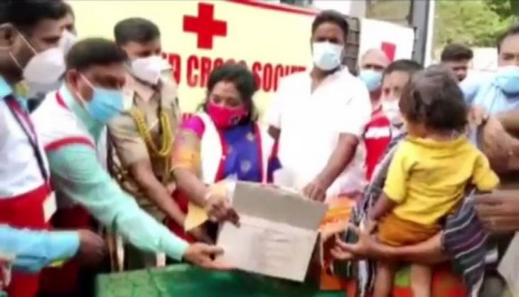Puducherry LG visits Karuvadikuppam area to distribute flood relief material