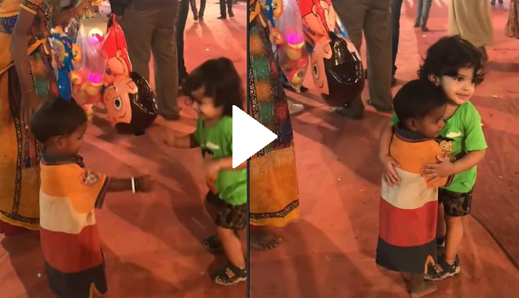 Street seller’s son gives a tight hug to little boy; awdorable video will teach you a lesson