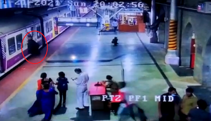 Woman slips while trying to board moving train; horrifying incident caught on camera
