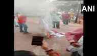 Bajrang Dal activists set fire to 'Pakistani food festival' banner in Gujarat's Surat