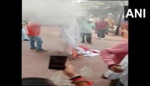 Bajrang Dal activists set fire to 'Pakistani food festival' banner in Gujarat's Surat