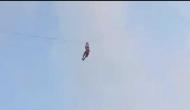 Caught On Cam: Kite flying gone wrong, man finds himself airborne after strong gust of wind 