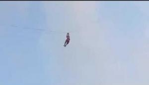 Caught On Cam: Kite flying gone wrong, man finds himself airborne after strong gust of wind 