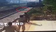 Caught on cam: Man narrowly escapes death after train driver hits emergency brakes in nick of time
