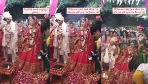Panditji asks groom and bride to play this hilarious game during wedding; watch who wins?