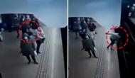 Woman intentionally pushed in front of train, watch hair-raising video 