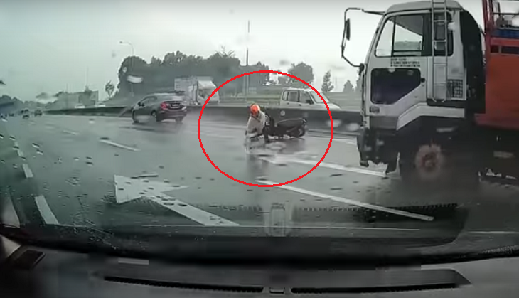 Motorcyclist falls in front of speeding truck; dashcam footage will haunt you in your sleep!
