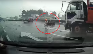 Motorcyclist falls in front of speeding truck; dashcam footage will haunt you in your sleep!
