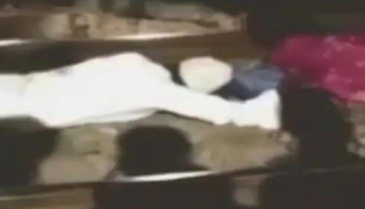 Man jumps under moving train to save girl fallen on tracks; rescue video goes viral