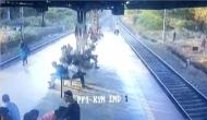 Caught on cam: Man jumps in front of train with 6-year-old son 