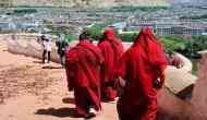 Tibetan monk who spent more than 20 years in Chinese prisons dies at 61
