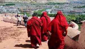 Tibetan monk who spent more than 20 years in Chinese prisons dies at 61