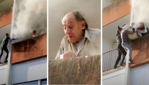 Caught on cam: 3 friends rescue elderly man stuck in building on fire 