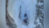 Man clings to mountain edge during avalanche, watch hair raising video 