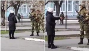 Ukrainian woman bravely confronts heavily armed Russian troops [Watch]