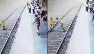 Maharashtra super cop jumps onto railway tracks to rescue teen seconds before train crosses [Watch] 