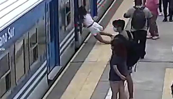 Woman miraculously survives after fainting and falling under moving train; watch video  