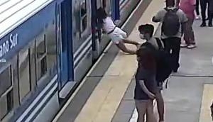 Woman miraculously survives after fainting and falling under moving train; watch video  