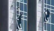 Video: Brave man risks his life to save child dangling from 8th floor  