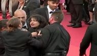 'Stop raping us': Topless woman storms Cannes red carpet to protest against sexual violence in Ukraine