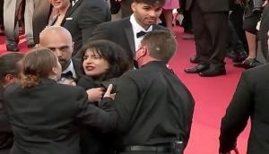 'Stop raping us': Topless woman storms Cannes red carpet to protest against sexual violence in Ukraine