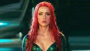 Amber Heard's agent claims her 'lack of chemistry' with Jason Momoa led to reduced role in 'Aquaman 2'