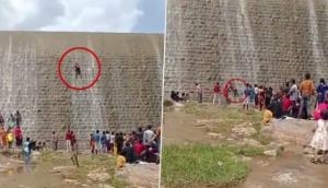 Stunt goes wrong, man falls 30-feet off dam during dangerous climb [Watch] 