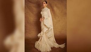 Deepika Padukone bids adieu to Cannes Film Festival in white ruffle saree 
