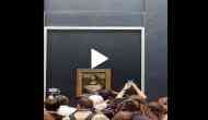 Man disguised as old woman smears cake on Mona Lisa; video goes viral