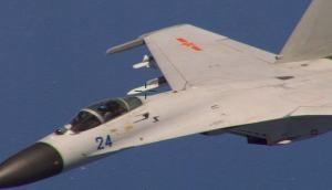 Chinese fighter jet's aggressive manoeuvre endangers Australian reconnaissance plane near South China Sea