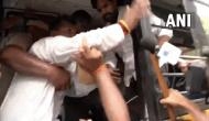 Watch: Congress' Srinivas dragged into police bus as he dramatically tries to escape