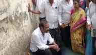 YSRCP MLA enters open drain as mark of protest against civic authorities