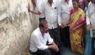 YSRCP MLA enters open drain as mark of protest against civic authorities