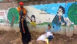 MP minister orders probe after video surfaces of 8-year-old boy sitting on roadside with body of his kid brother
