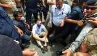 Rahul Gandhi sits on road in protest as Sonia Gandhi questioned by ED