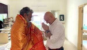 Anupam Kher welcomes SS Rajamouli with traditional shawl wrapping in Hyderabad