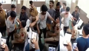 Viral video shows constable beaten by mob inside police station