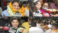 CWG medallists Sakshi Malik, Pooja Sihag, and Pooja Gehlot given thunderous welcome at Delhi airport
