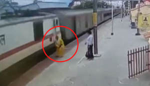 Woman crossing railway tracks saved just in time, but she made another shocking move!