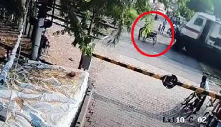 Man attemps to cross railway track even when signal was red; here's what happens next [Watch]