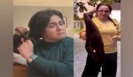 Iranian women burn hijabs, chop hair in protest against Mahsa Amini death in morality police detention