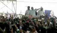 PM Modi holds roadshow in Surat, waves to people gathered to greet him