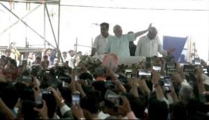 PM Modi holds roadshow in Surat, waves to people gathered to greet him