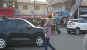 Dead niece on shoulder; Madhya Pradesh man walks on busy road to bus stop [Watch]