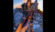 Viral video shows man sleeping in hammock atop two mountains, netizens are stunned