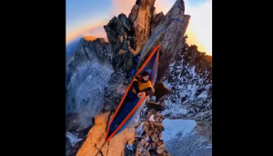 Viral video shows man sleeping in hammock atop two mountains, netizens are stunned