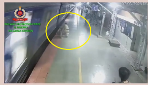 Quick-thinking RPF officer saves girl from slipping under train [Watch]